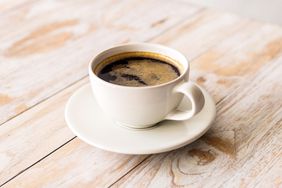 Close-up of black coffee on table
